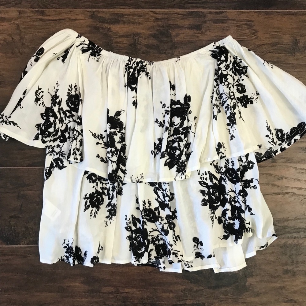 Lulu’s white and black off the shoulder top
